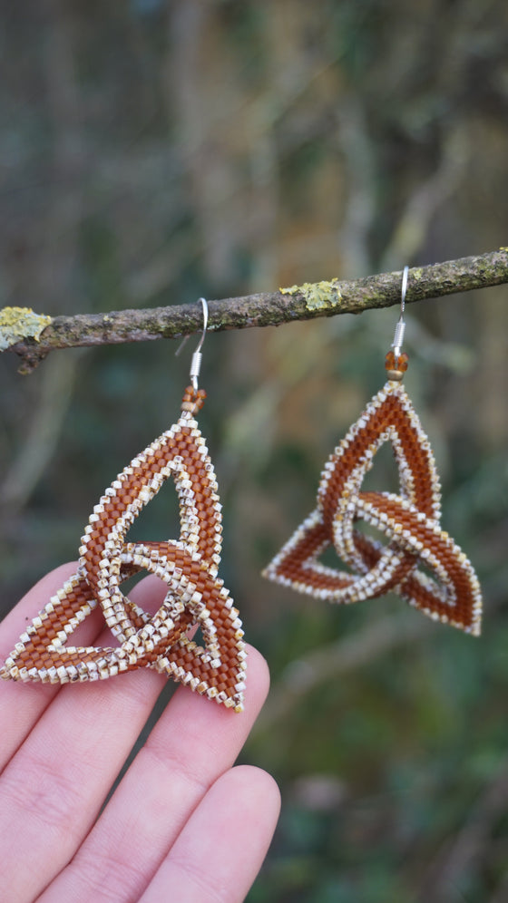 triquetra ◌ burnt orange